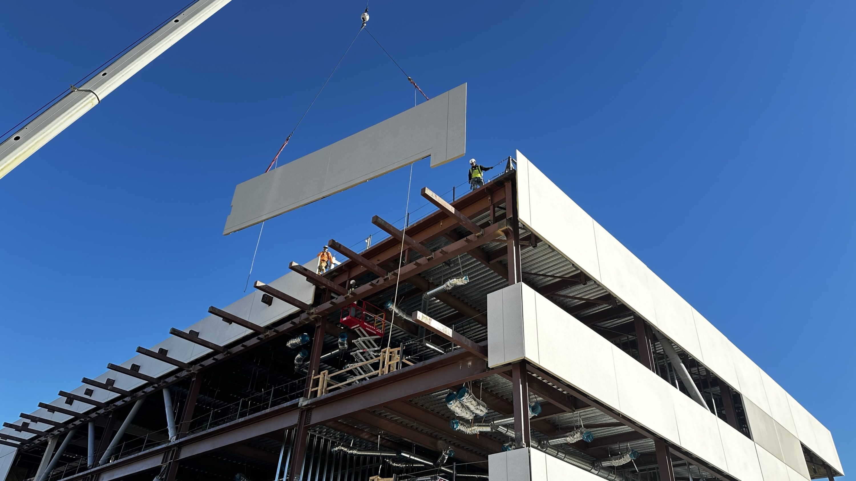 A concrete skin spandrel going into place at SBC Valley Communications