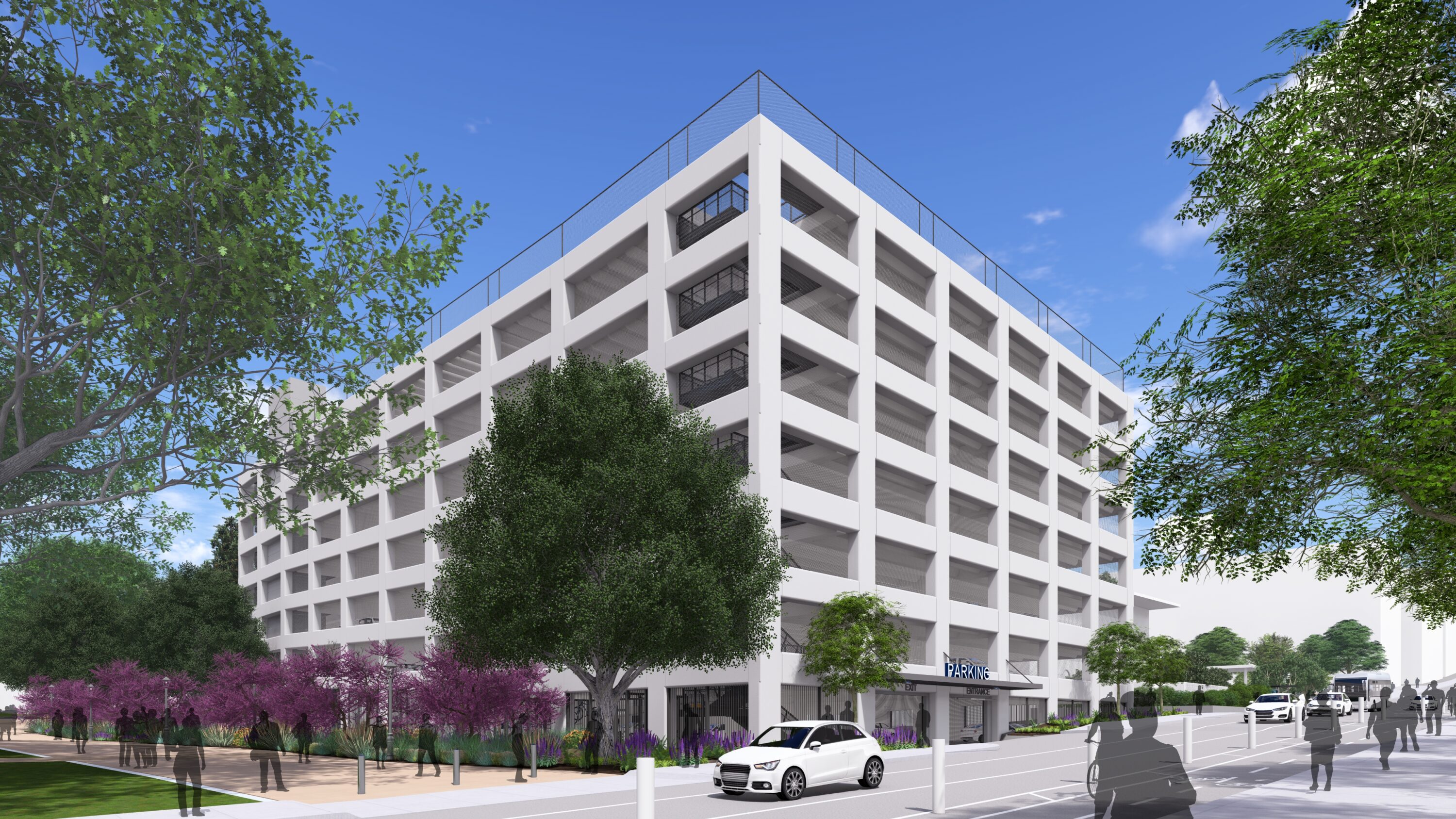 Modern parking structure with surrounding trees
