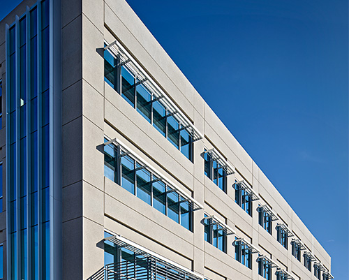 Modern office building with blue sky backdrop